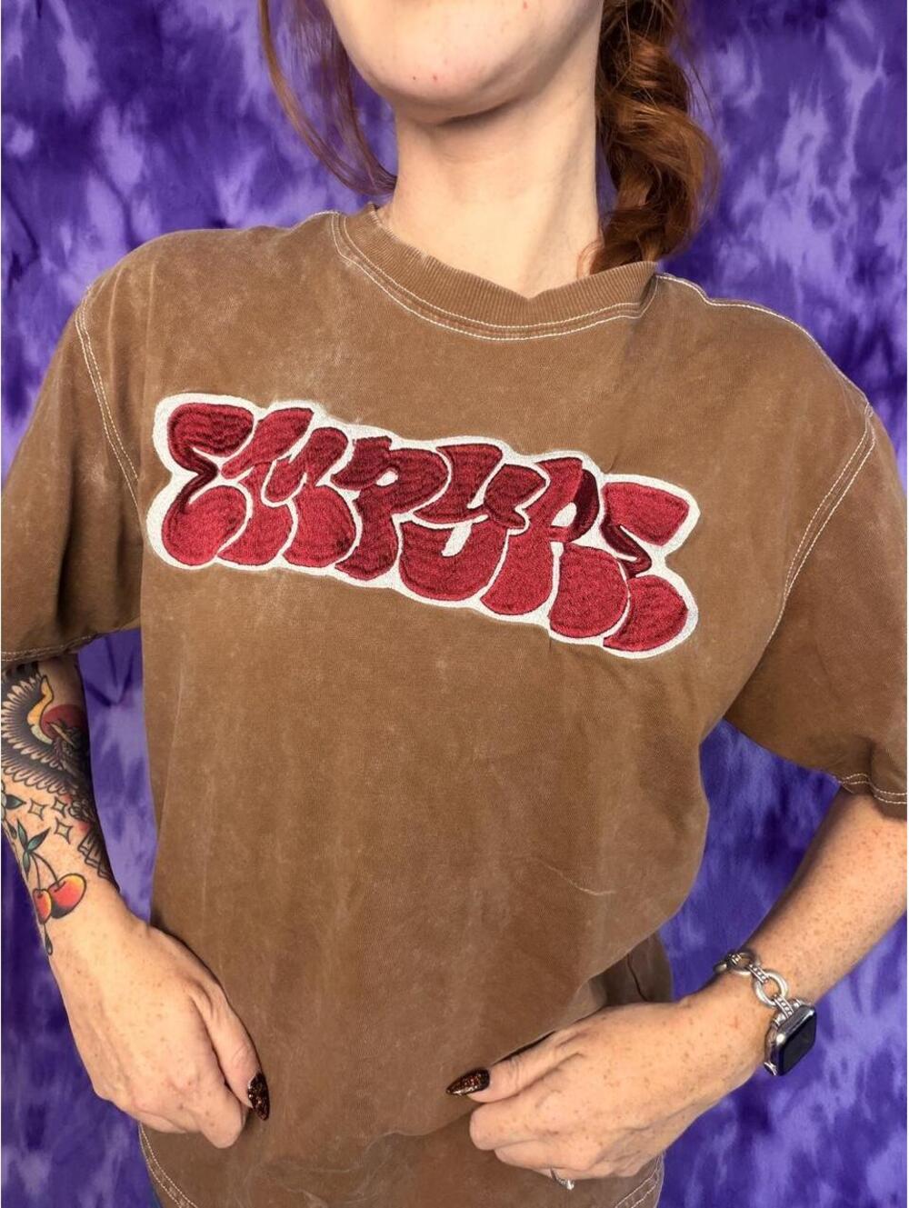 Empyre skate brown tee with embroidery front and back.